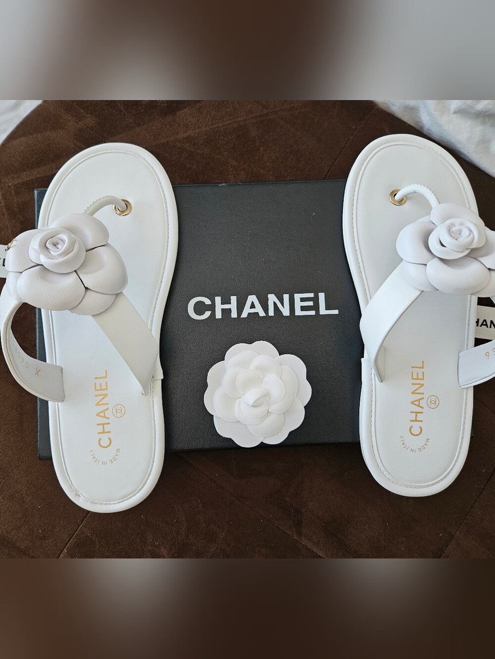 CHANEL White Camellia Leather Slide Sandals with Gold Eyelets